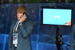 DORTMUND, GERMANY - JUNE 18: Howard Webb looks on from the side of the pitch whilst on the phone prior to the UEFA EURO 2024 group stage match between Turkiye and Georgia at Football Stadium Dortmund on June 18, 2024 in Dortmund, Germany. (Photo by Michael Regan - UEFA/UEFA via Getty Images) Premier League