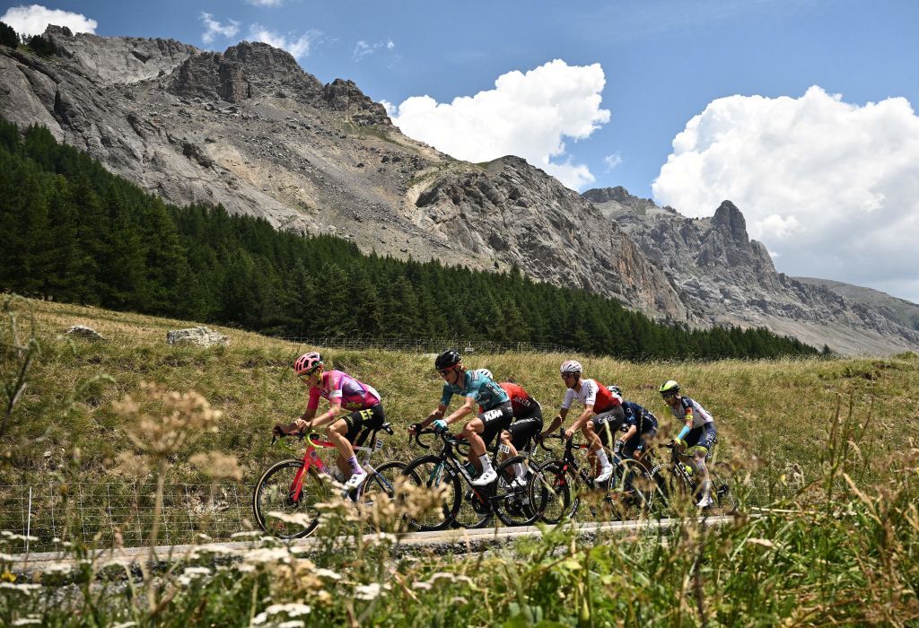 EF EducationEasypost teams American rider Neilson Powless L leads a breakaway during the 12th stage of the 109th edition of the Tour de France cycling race 1651 km between Briancon and LAlpedHuez in the French Alps on July 14 2022 Photo by Marco BERTORELLO AFP Photo by MARCO BERTORELLOAFP via Getty Images