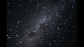 stars swirl in space.