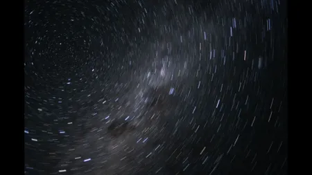 stars swirl in space.