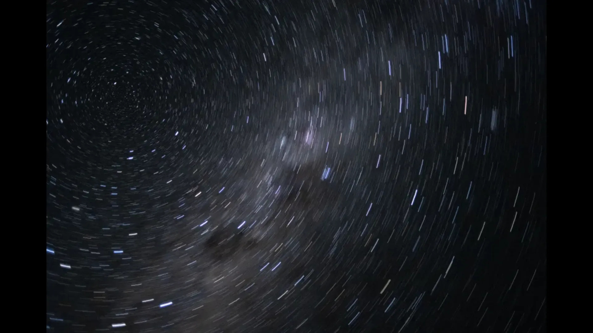 stars swirl in space.