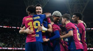 Barcelona players celebrate Robert Lewandowski's goal against Real Madrid in the Supercopa de España in January 2025.