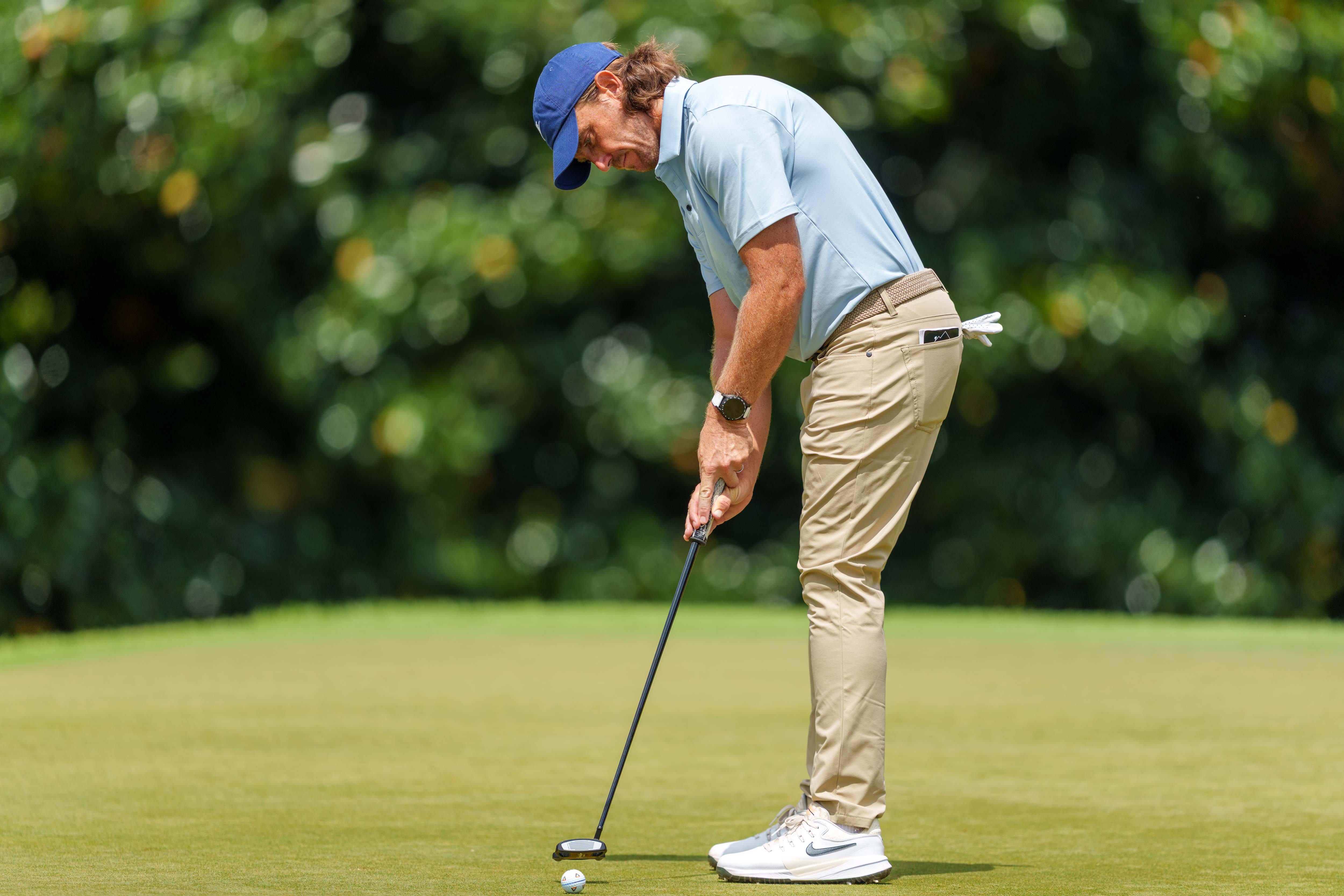 Tommy Fleetwood hits a putt