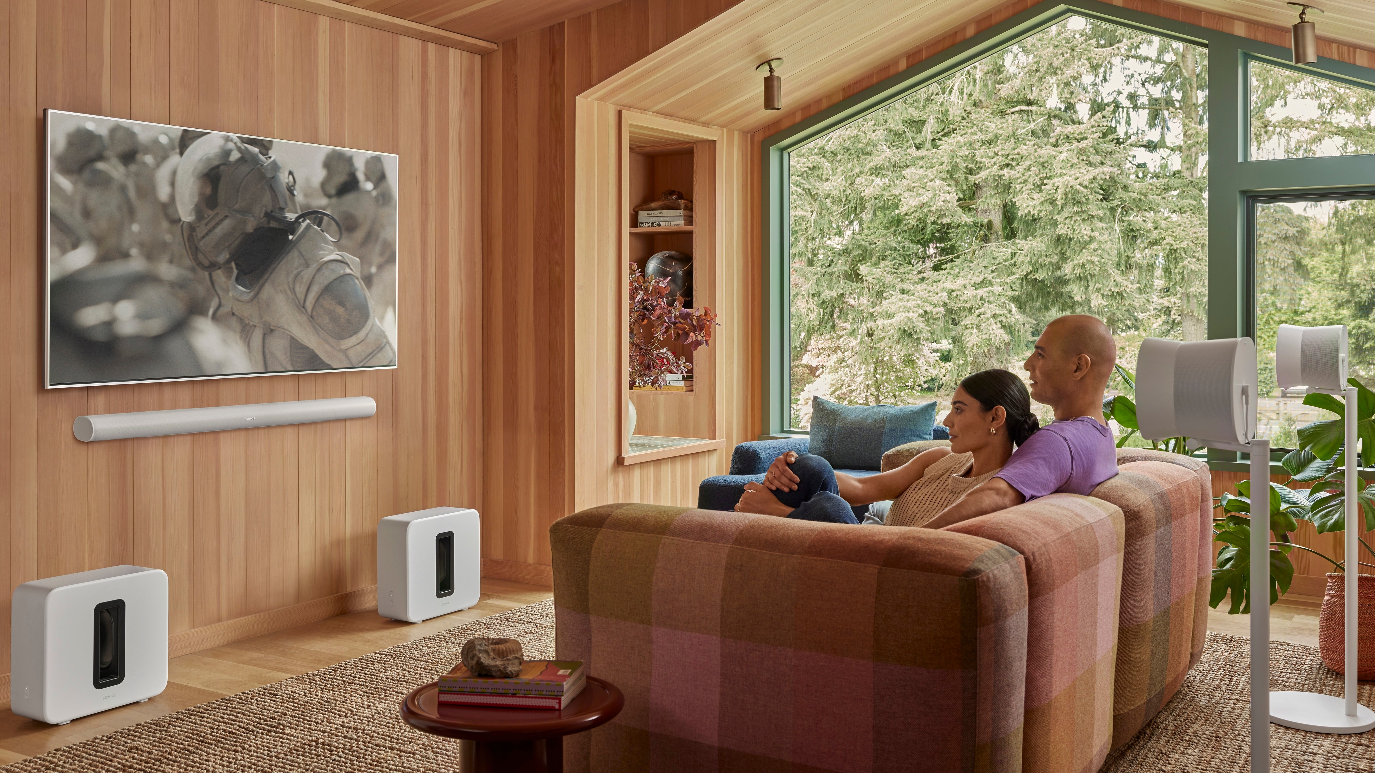 A couple enjoying their Sonos audio products.
