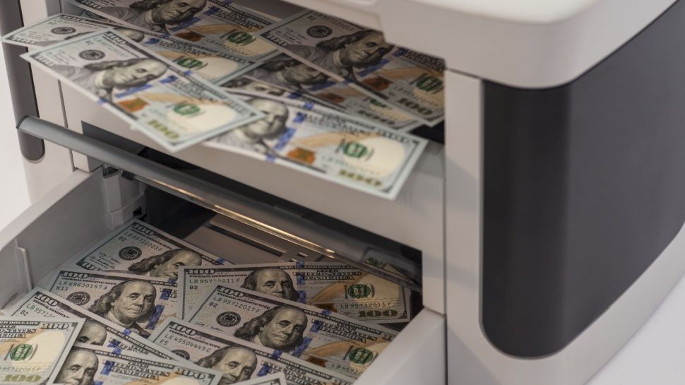 Printer printing fake dollar bills