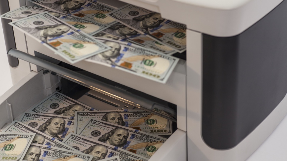 Printer printing fake dollar bills