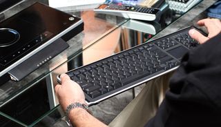 Bluetooth keyboard can be detached. Dell reps said it can last about a month on batteries.
