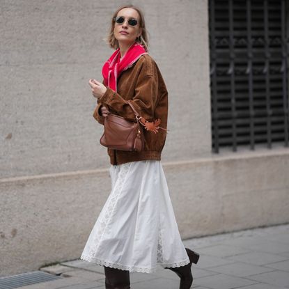 woman wearing street style triangle scarf outfit