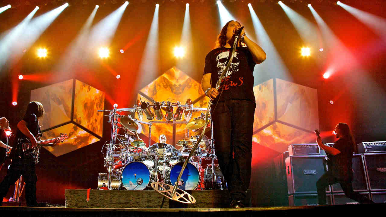 Dream Theater performing onstage in 2013