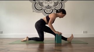 A woman doing half splits