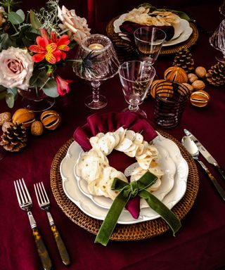 Burgundy Christmas table setting with homemade wreath