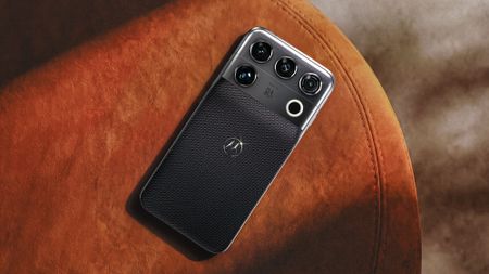 Motorola Signature 27 held in the hand.