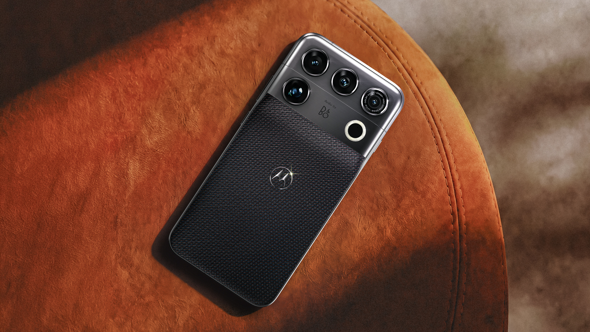 Motorola Signature 27 held in the hand.