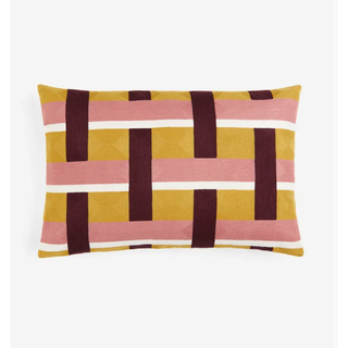 rectangle pillow with colorful geometric embroidered pattern