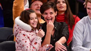 new york, ny december 16 suri cruise and katie holmes attend the oklahoma city thunder vs new york knicks game at madison square garden on december 16, 2017 in new york city photo by james devaneygetty images