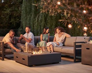 kettler fire pit and sofa on patio