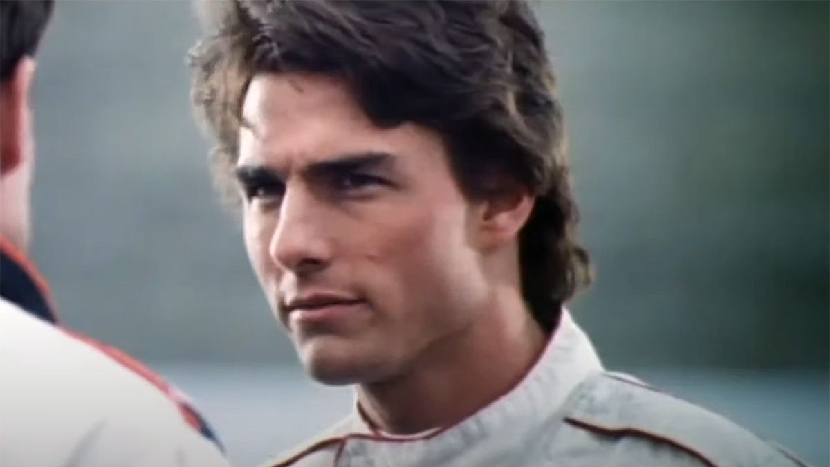 Tom Cruise in his racing suit talking to Robert Duvall in Days of Thunder