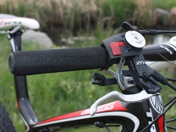 The DT Swiss rear shock lockout is somewhat hard to operate while on the trail and we never got on with the Bontrager foam grips, which tended to rotate on the bars and don't provide much useful cushioning, either.