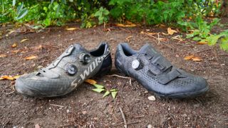 Shimano RX8 and Specialized S-Works Recon heel to heel on a dirt surface