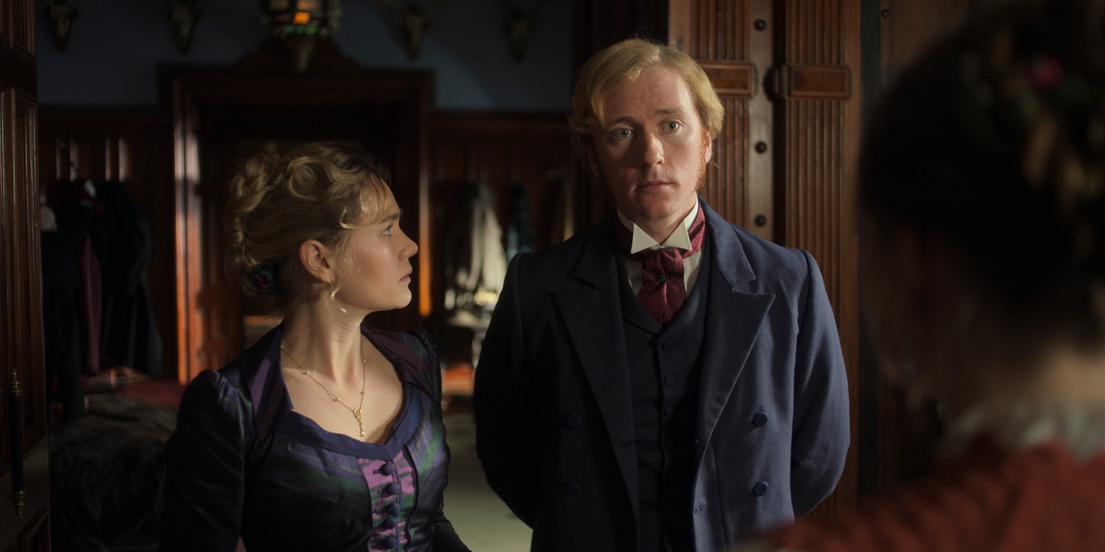 Imogen Waterhouse looking at Barney Fishwick who looks stern in the buccaneers season 1