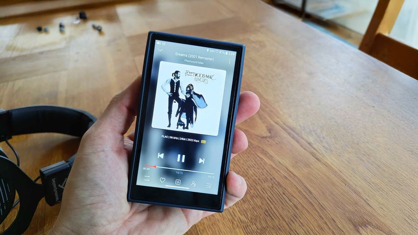 FiiO M21 portable music held in hand