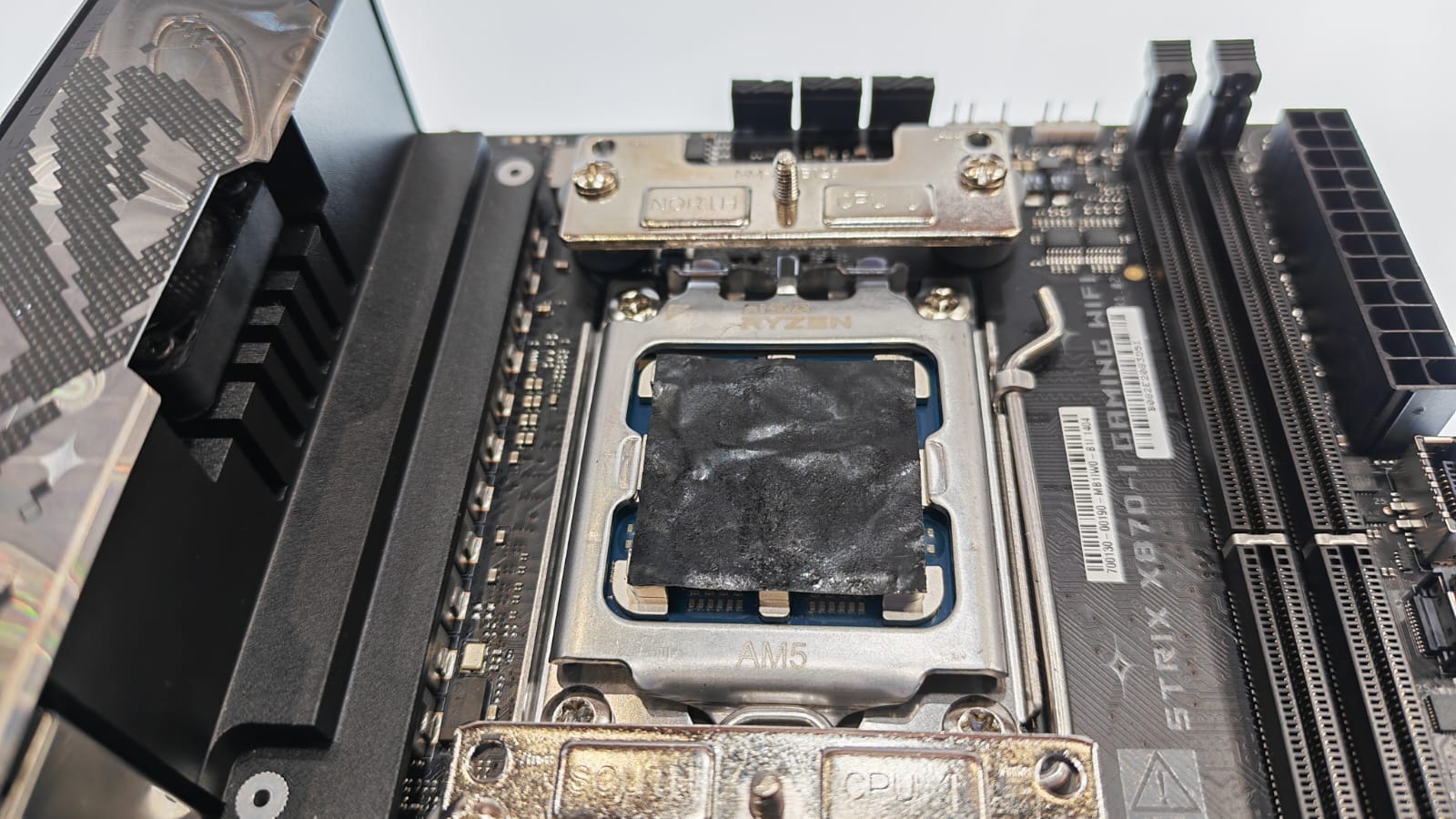 An image of the NT-CP1 Carbice Carbon Nanotube Thermal Pad on a motherboard at Computex 2026