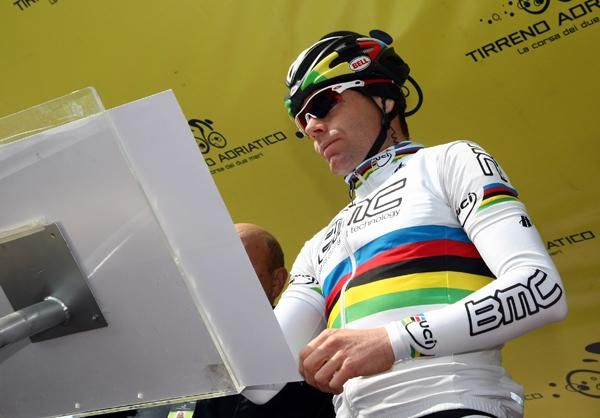 World Champion Cadel Evans (BMC) signs in
