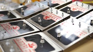 9 Electro-Harmonix Big Muffs at varous stages of completion at the factory