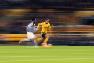 Matheus Cunha of Wolverhampton Wanderers runs with the ball during the Premier League match between Wolverhampton Wanderers FC and Aston Villa FC at Molineux on February 01, 2025 in Wolverhampton, England.