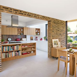 modern wood open plan kitchen with stone look floor tiles