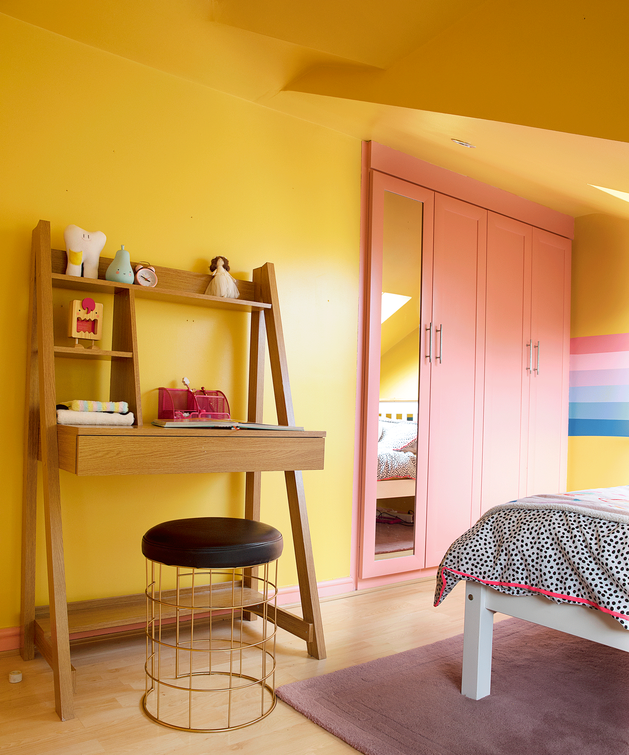 Karen Clough used left over paint to create a rainbow bedroom for less than £100