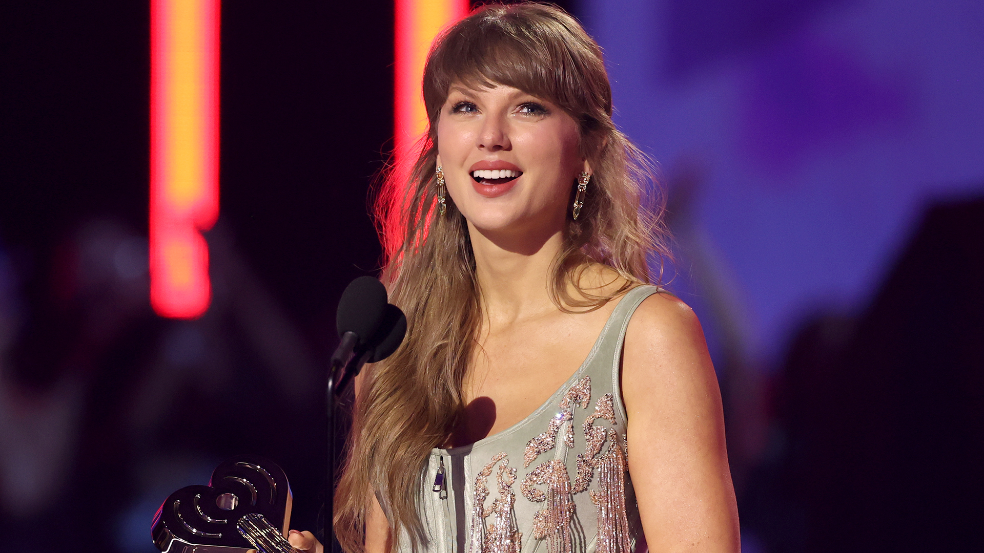 Taylor Swift traded her Jimmy Choo mint green pumps for strappy crystalized heels from Aquazzura at the iHeart Radio Music Awards 2026