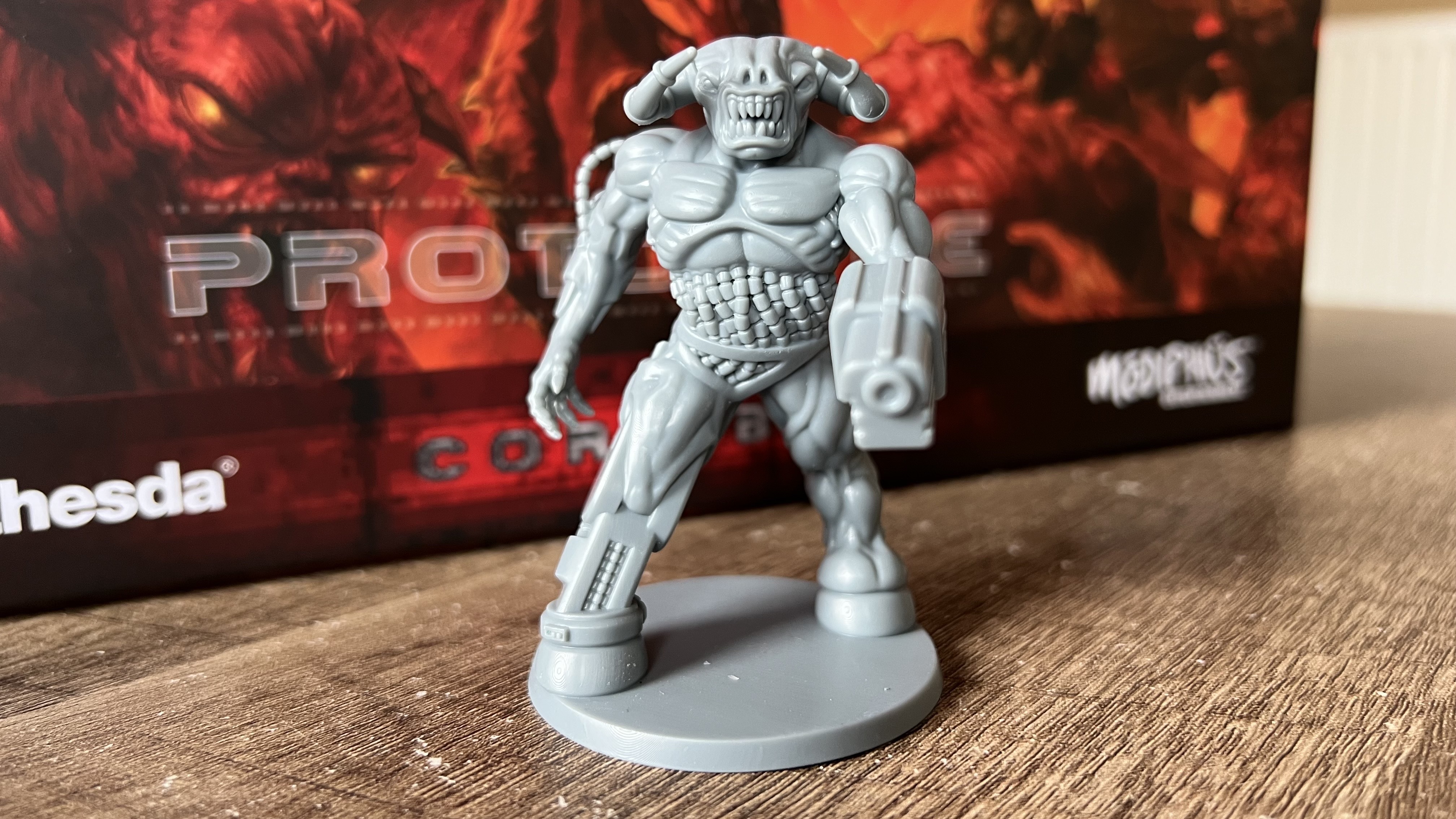 Close up on Cyberdemon miniature from Doom Arena Board Game