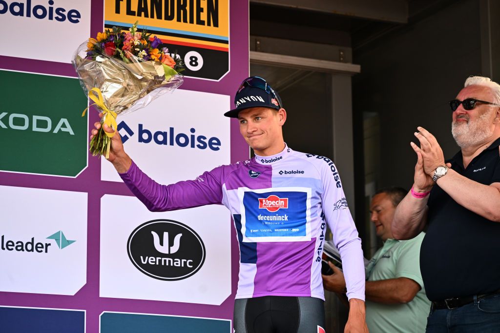 BEVEREN BELGIUM JUNE 16 Mathieu Van Der Poel of The Netherlands and Team AlpecinDeceuninck celebrates at podium as Purple Leader Jersey winner sprints during the 92nd Baloise Belgium Tour 2023 Stage 3 a 152km individual time trial stage from Beveren to Beveren on June 16 2023 in Beveren Belgium Photo by Mark Van HeckeGetty Images
