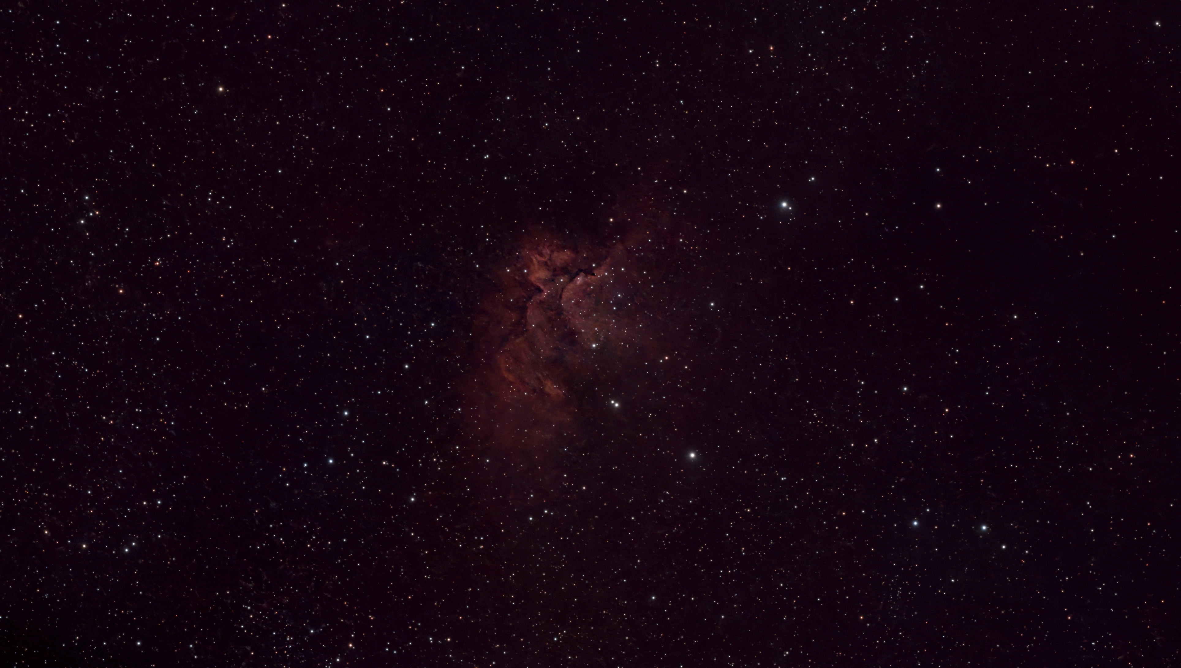 A photograph of the Wizard Nebula, taken with the Dwarf III smart telescope, processed in Pixinsight