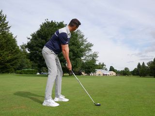 Golfer wearing Puma RS-G Sneakers