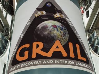 NASA's Gravity Recovery and Interior Laboratory, or GRAIL, spacecraft logo is emblazoned on the first stage of a United Launch Alliance Delta II launch vehicle, now secured in the gantry at Cape Canaveral Air Force Station's Space Launch Complex 17B.