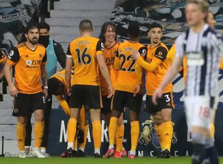 Fabio Silva (centre) celebrates scoring Wolves' opener