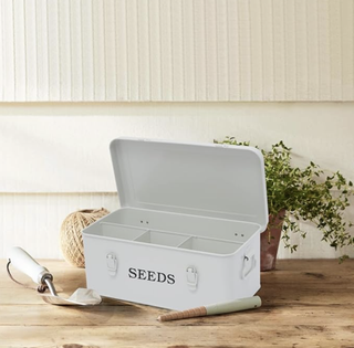 white metal seed storage box