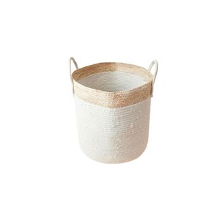 White storage basket with tan perimeter on the top and handles