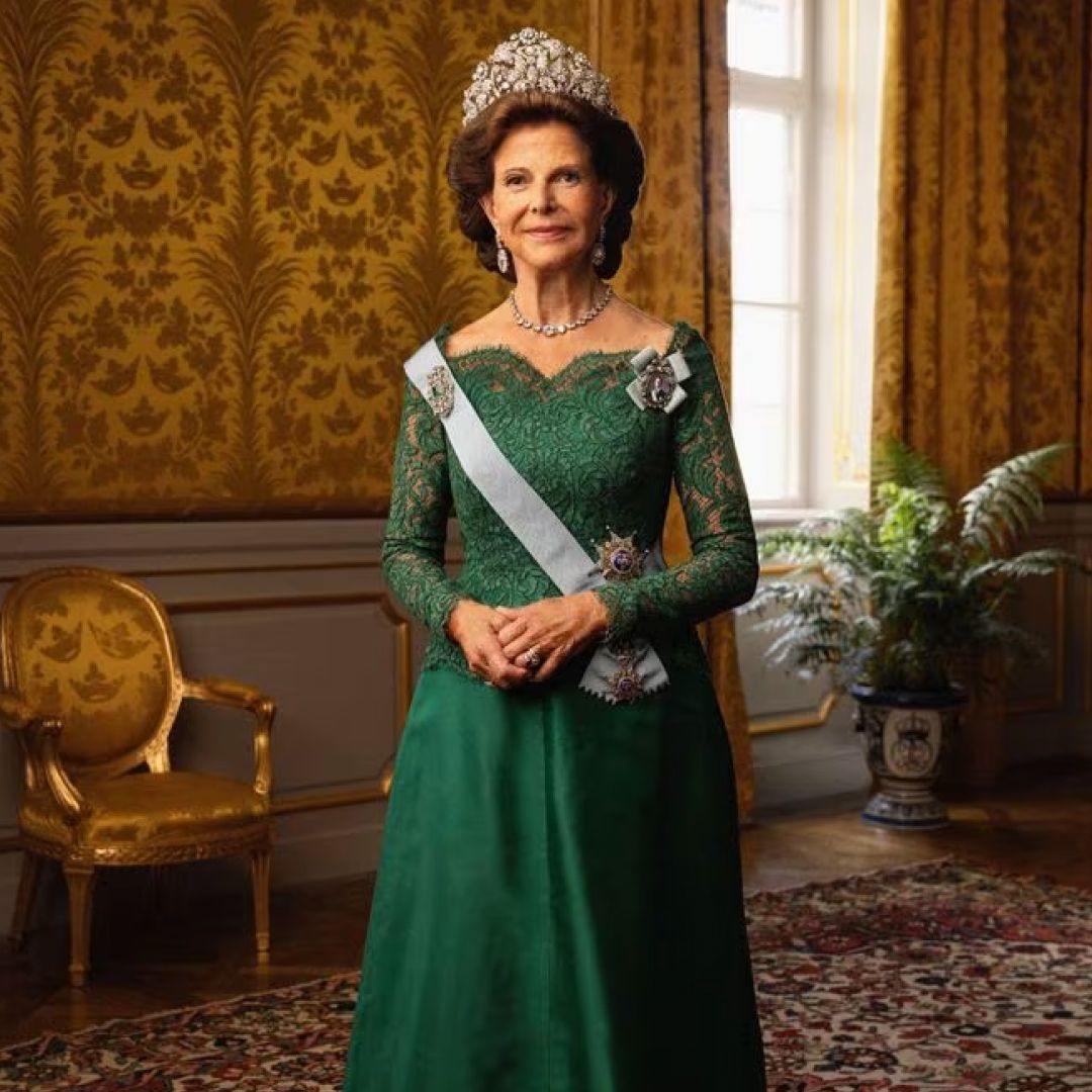 Queen Silvia wearing a green lace gown and diamond tiara