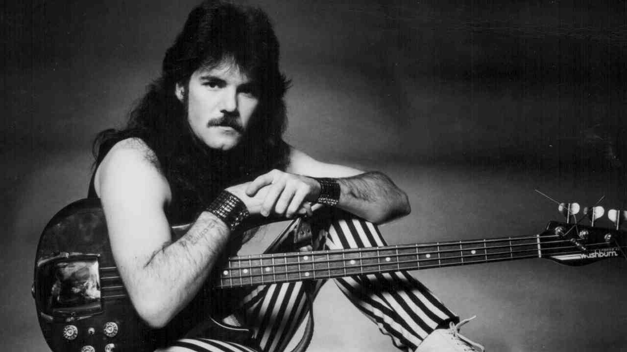 Spider bassist Brian Burrows posing for a photograph in the 1980s