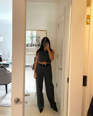 @nicoleakhtarzad outfit mirror selfie vest and trousers