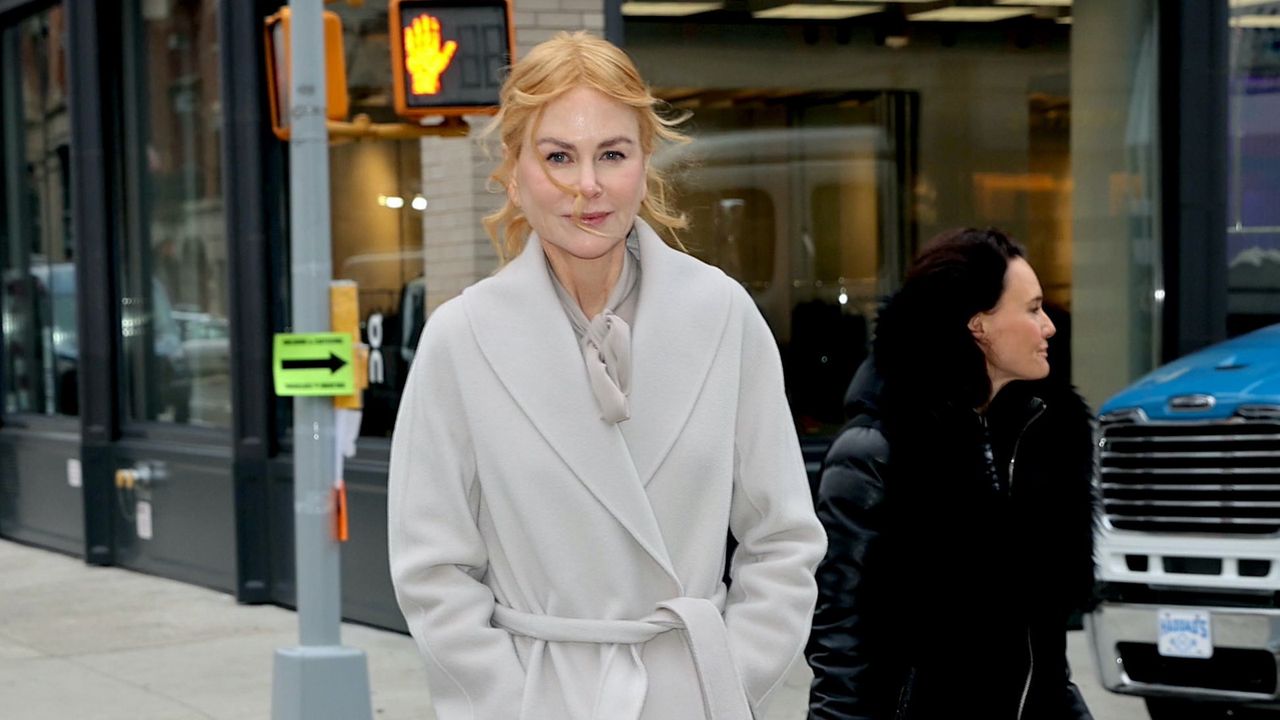 Nicole Kidman wearing a light grey wool coat