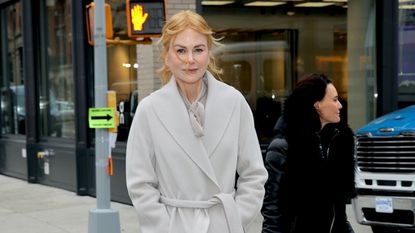 Nicole Kidman wearing a light grey wool coat