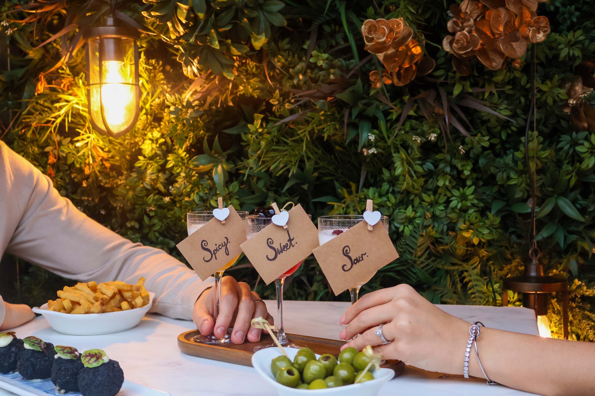 The Hari in Belgravia with signs on a table