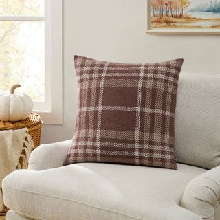 A checkered red and white throw pillow from Walmart