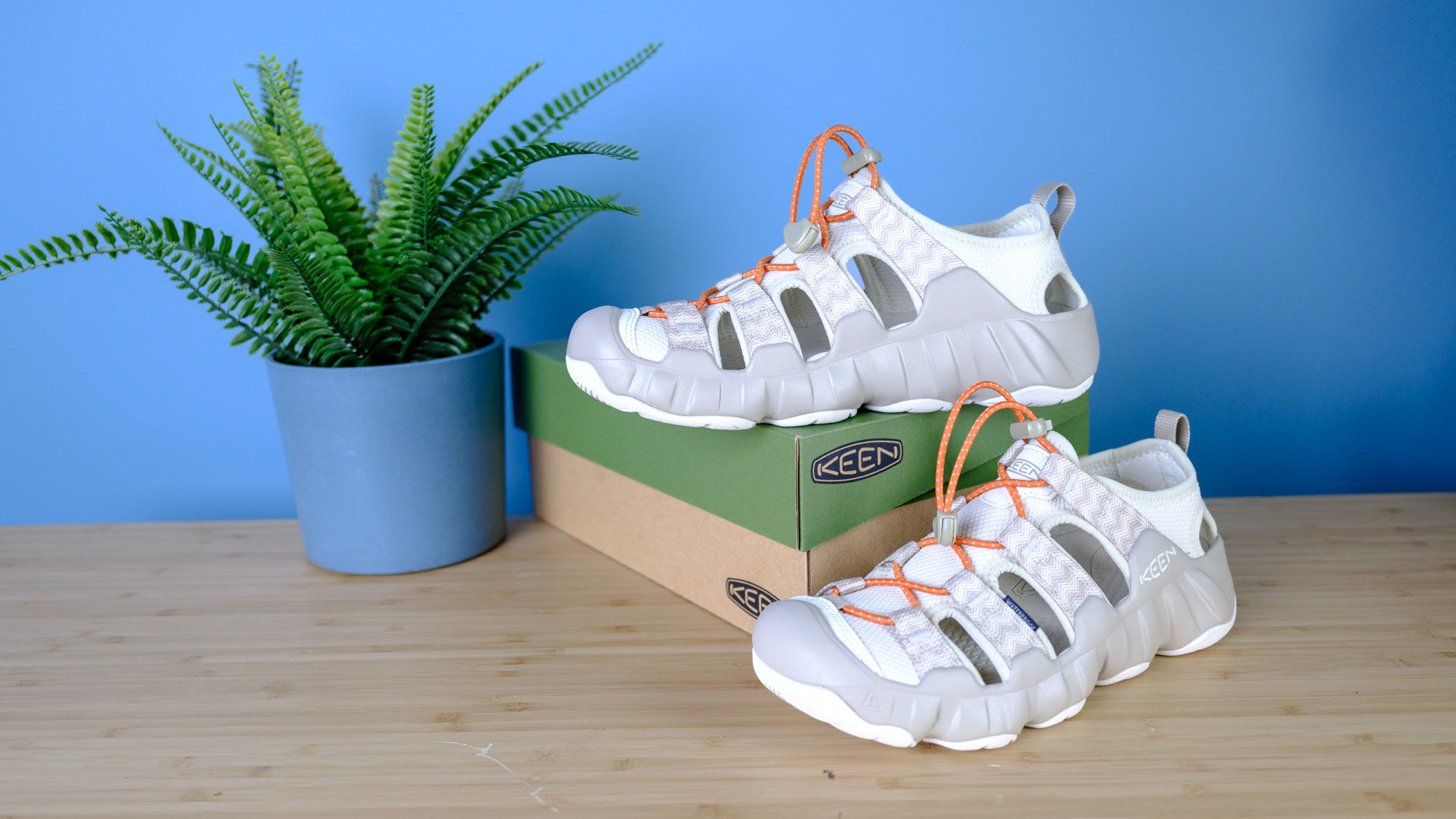 the Keen Hyperport H2 water hiking sandals with aquagrip soles, injected foam soles, and a cinch clasp for slip-on ease, in the taupe/coral colorway