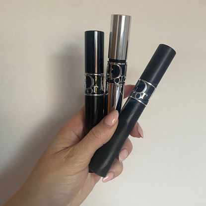 Lucy Abbersteen holding all three Dior mascaras