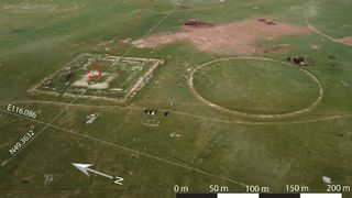 An aerial view of an excavation site in the countryside of Mongolia. 